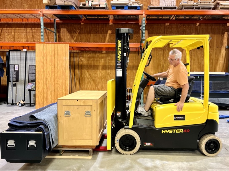 moving traveling exhibit with forklift